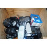 A box of various mobile phones and a camera (sold