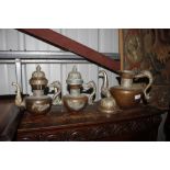 Three brass and copper Tibetan teapots