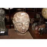 A Chinese carved wooden head