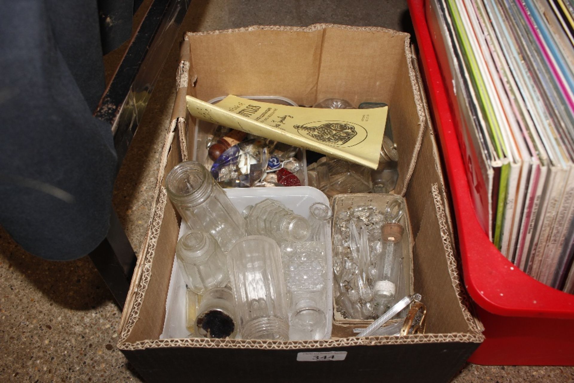 A box of various glass items to include prism drop