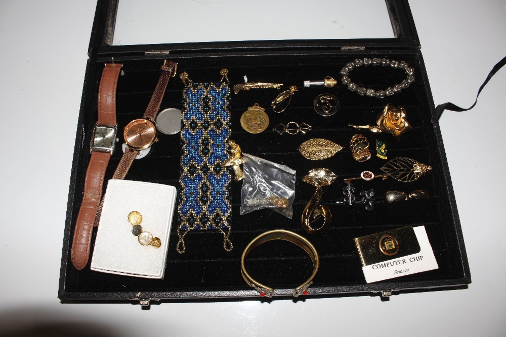 A Jewellery display case and contents of various c
