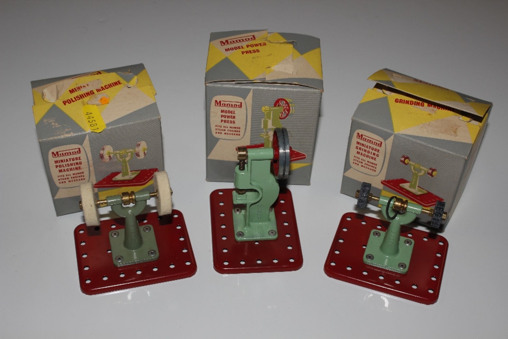 A boxed Mamod miniature grinding machine; a simila