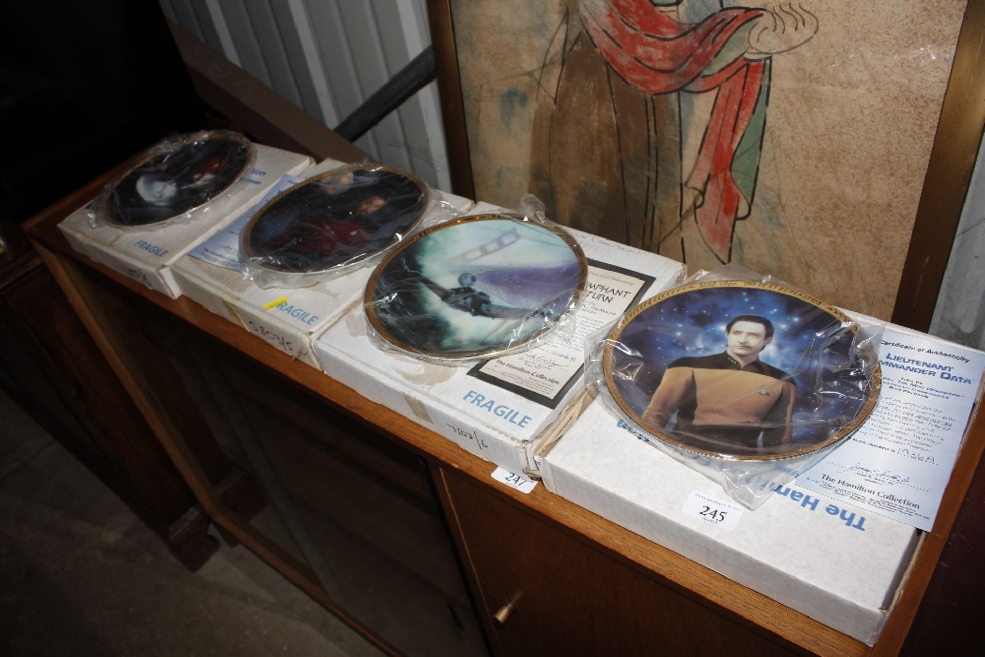 Four Star Trek collector's plates, boxed