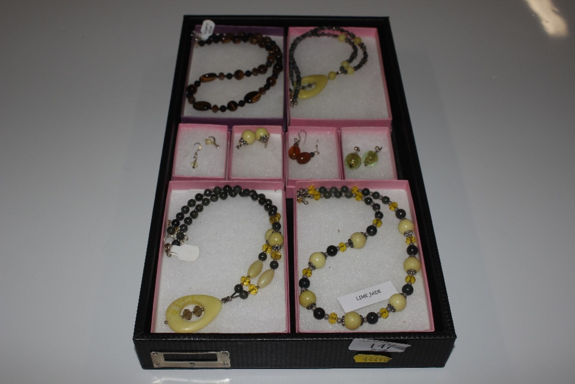 A box of various hand made jewellery comprising se