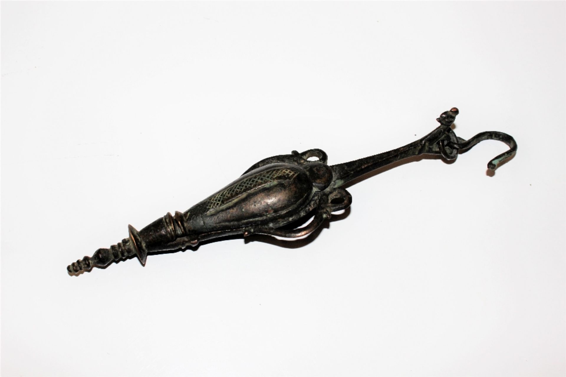 An antique style bronze fish hook