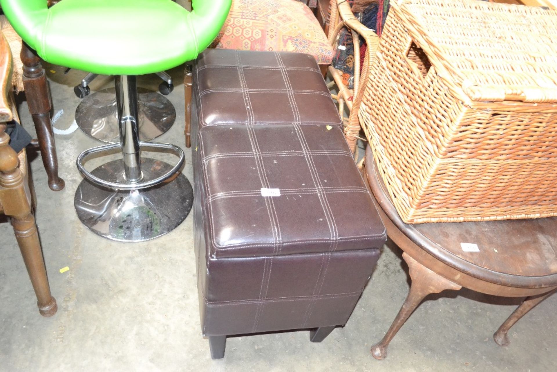 Two faux leather upholstered storage stools