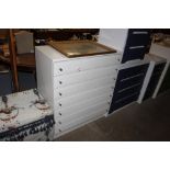 A modern bedroom chest fitted seven drawers