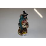 A Royal Doulton figure "The Mask Seller"