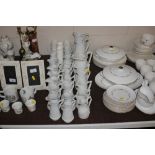 A collection of various relief moulded jugs etc.