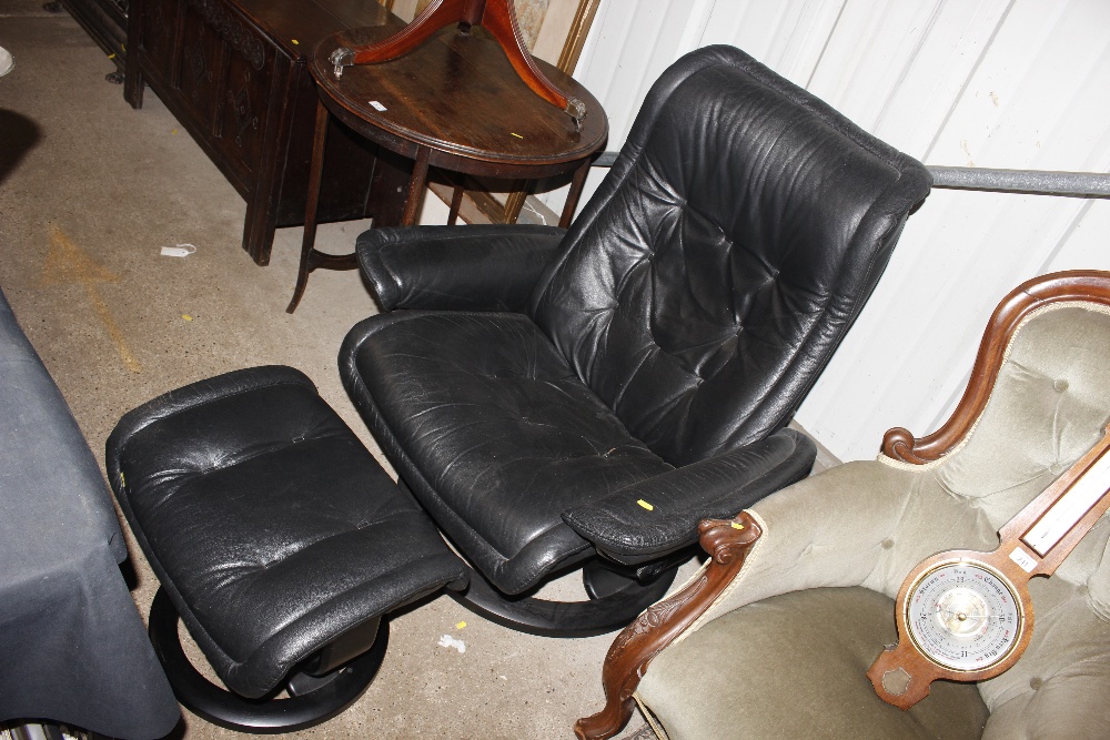 A Ekornes of Norway leather upholstered swivel cha