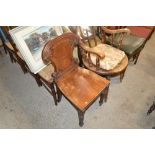 A Victorian mahogany shield back hall chair