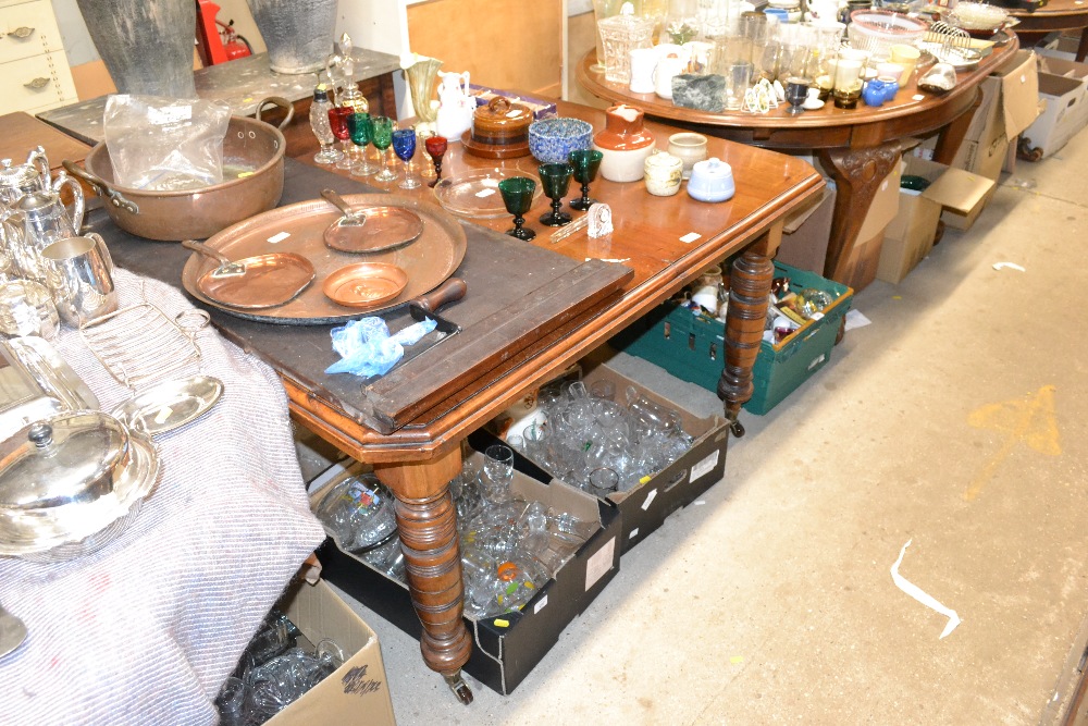 A late Victorian mahogany extending dining table,