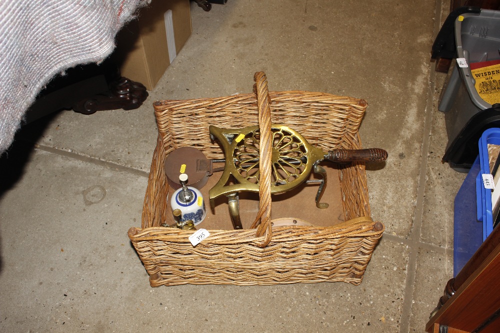 A chestnut roaster and a brass trivet; a pair of b
