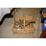 A chestnut roaster and a brass trivet; a pair of b