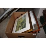 A box of miscellaneous pictures and prints