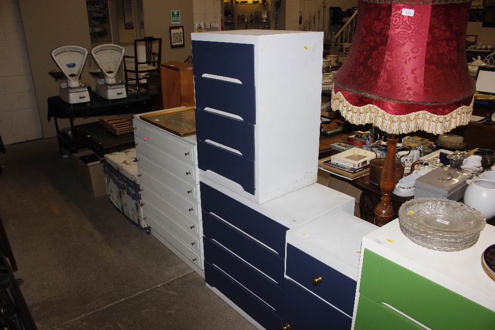 A blue and white painted chest fitted four drawers