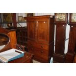 A 19th Century oak press cupboard, the upper secti