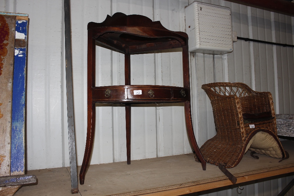 A Georgian corner washstand fitted three drawers