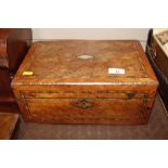 A Victorian walnut and inlaid writing box, interio