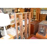 A stripped pine hanging plate rack