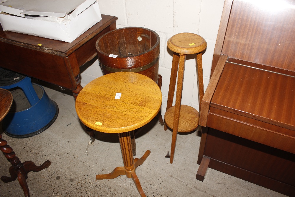 An oak two tier plant stand and an oak tripod base