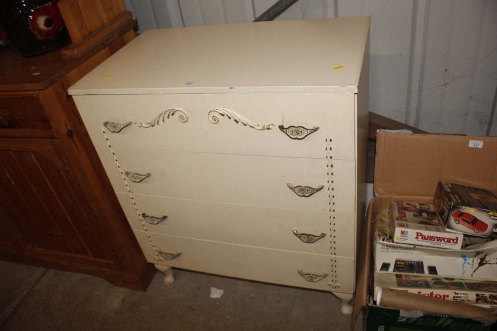 A cream painted French style chest fitted four lon