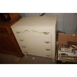 A cream painted French style chest fitted four lon