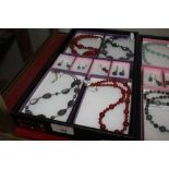 A box of various hand made jewellery to include sh