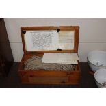 An Excelsior ships log in fitted box