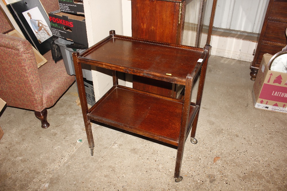 A mahogany two tier tea trolley