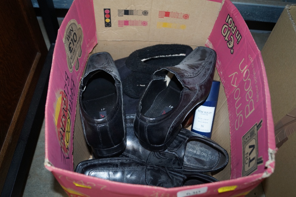 A box of various shoes