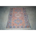 An approx. 4'5" x 3' patterned rug