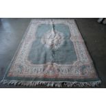 An approx. 9'2" x 5'9" Chinese patterned rug