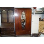 An Edwardian mahogany and inlaid mirrored door war