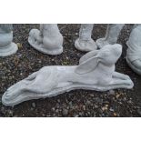 A concrete garden ornament in the form of a hare