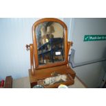 A Victorian mahogany swing framed mirror