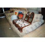 An upholstered three seater settee and matching tw