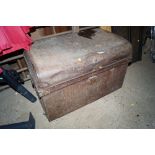 A metal storage trunk