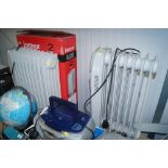 An Igenix electric oil filled radiator and another