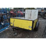 An approx. 6' x 4' single axle car trailer with tailgate ramp
