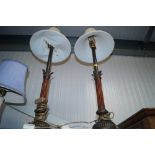 A pair of table lamps with shades