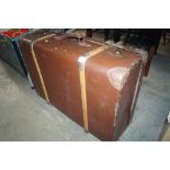 A wooden bound suitcase