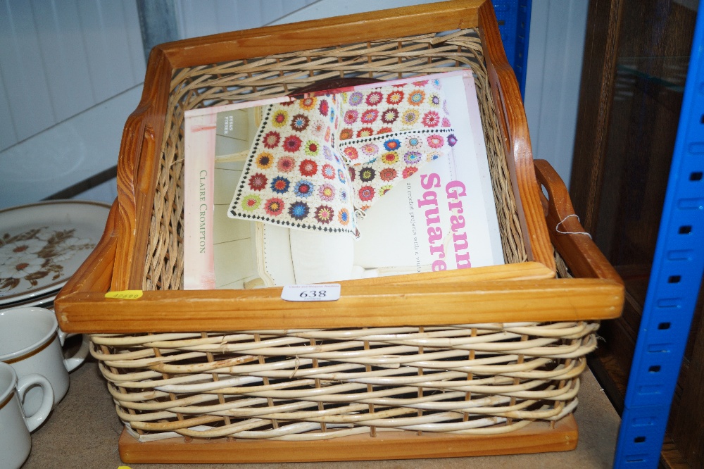 Two wicker baskets and crochet books