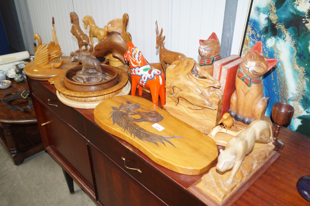 A collection of various carved wooden items to inc