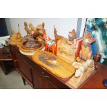 A collection of various carved wooden items to inc