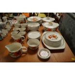 A collection of J & G Meakin "Poppy" patterned din