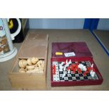 A box of wooden chess pieces, height of King appro