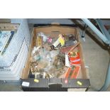 A box of various door furniture and hinges