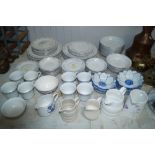 A collection of various patterned china; dinner an