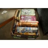 A box of "Companion Book Club" books